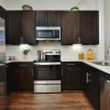 Kitchen with dark cabinets