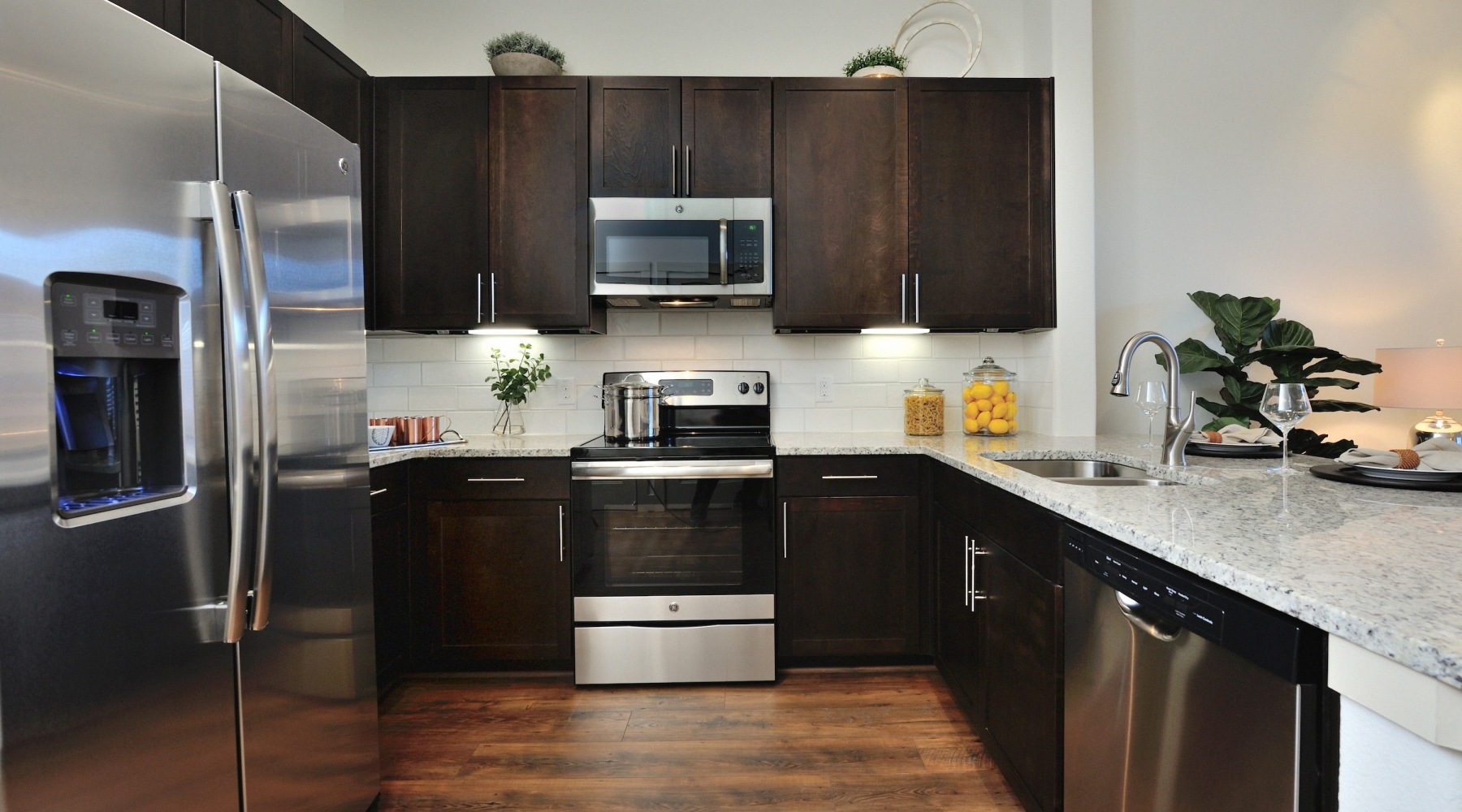 Spacious kitchens with thoughtful deatils Kitchen with dark cabinets
