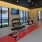 a room with exercise equipment and a window