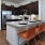 a kitchen with a table and chairs