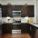 a kitchen with black appliances
